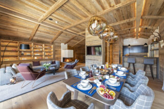 Dining table kitchen in living space at Chalech L in Lech