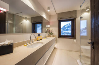 Shower room shared between bedrooms two and three at Nidus Penthouse in Lech