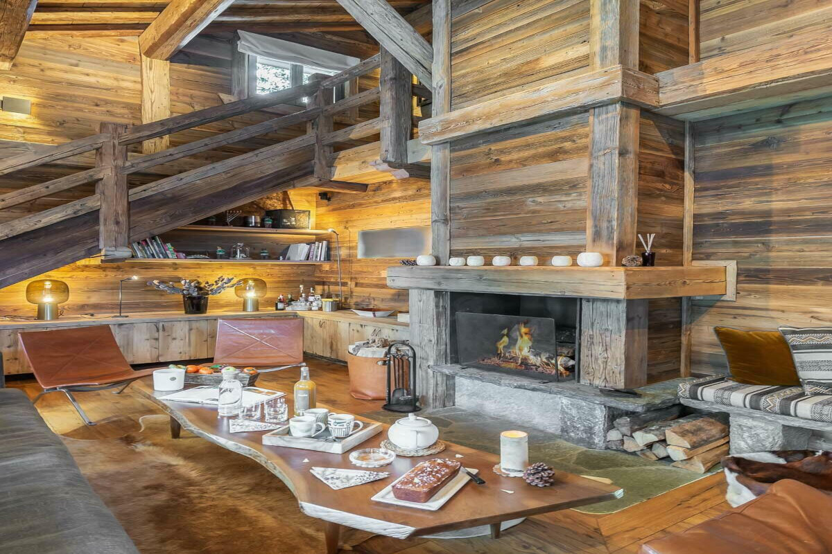 Open fire and lounge at Chalet Ima in Courchevel 1850