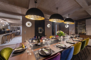 Dining to bar and lounge at Chalet Altius in Meribel