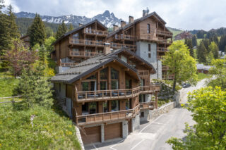 Exterior with mountain backdrop at Chalet Altius in Meribel
