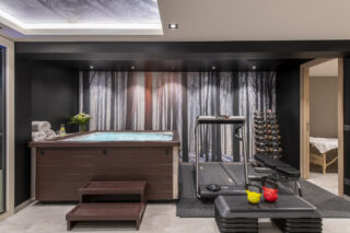 Hot tub, gym equipment and massage room at Chalet Altius in Meribel