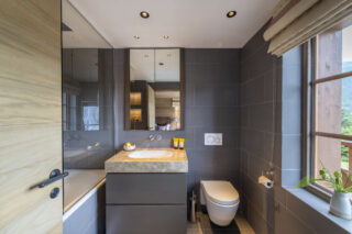 Bedroom two en suite bathroom at Chalet la Loze in Méribel