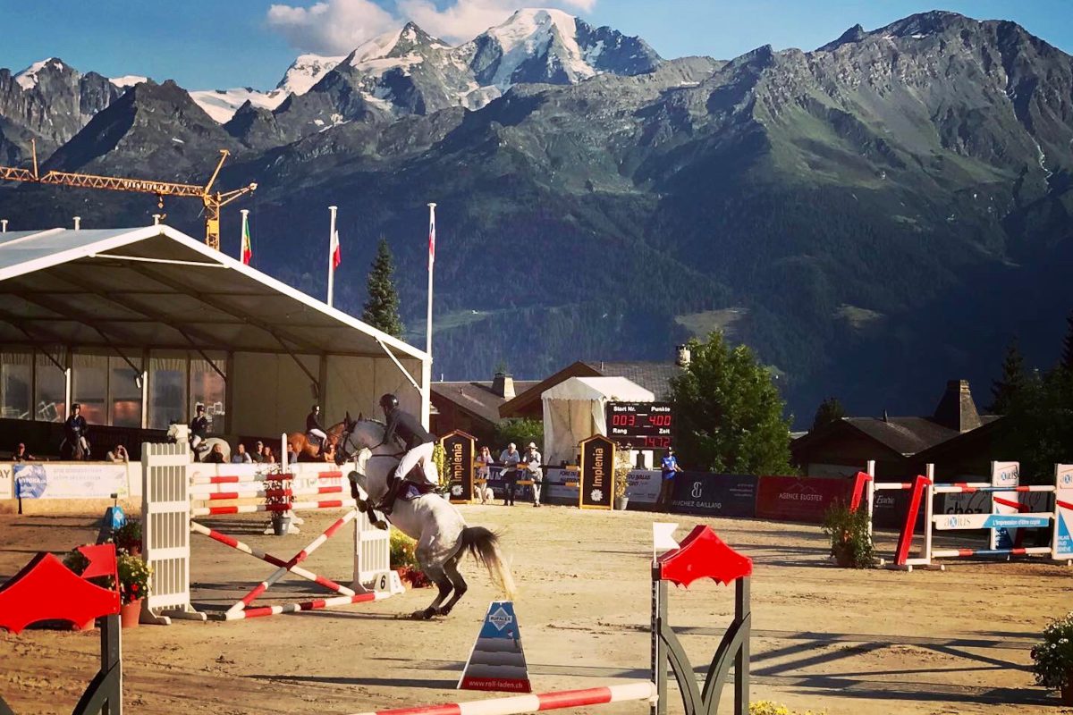 Show jumping in Verbier with views of Grnad Clambin Massif