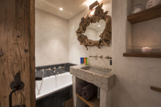 Bedroom one en suite bathroom at Chalet Bibi in Verbier