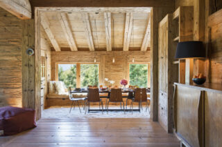 Looking into the dining room from the main living space at Chalet Bibi in Verbier