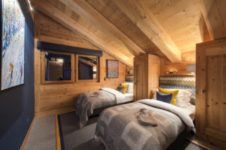 Twin bedroom at Entre Ciel et Terre in Verbier