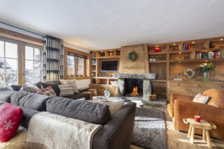 Stunning lounge and open fire at Apartment Hickory in Verbier