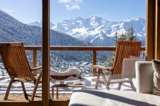 View over Verbier toward the Combins massif from the balcony at Chalet les Étrennes in Verbier