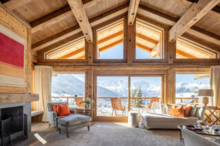 View over Verbier toward the Combins massif from the living room at Chalet les Étrennes in Verbier