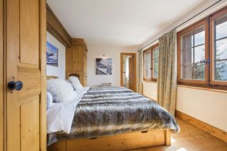 Double bedroom with mountain views at Chalet Milou in Verbier