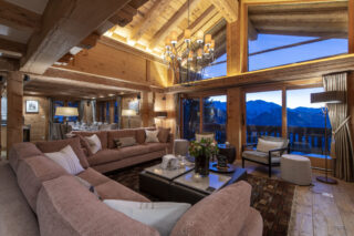 Incredible mountain views from lounge and dining at Chalet Milou in Verbier