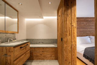 Bedroom four en suite bathroom at Chalet Pierrier in Verbier