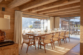 Dining table for ten people in the daytime at Chalet Pierrier in Verbier