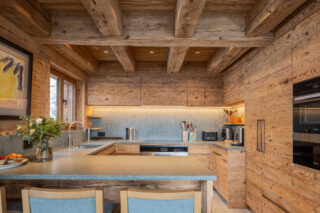 Open kitchen with breakfast bar at Chalet Pierrier in Verbier