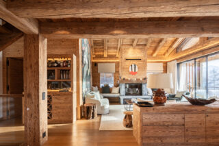 Open plan living space in the daytime at Chalet Pierrier in Verbier
