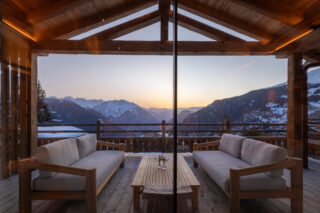 View from the balcony at dusk at Chalet Pierrier in Verbier