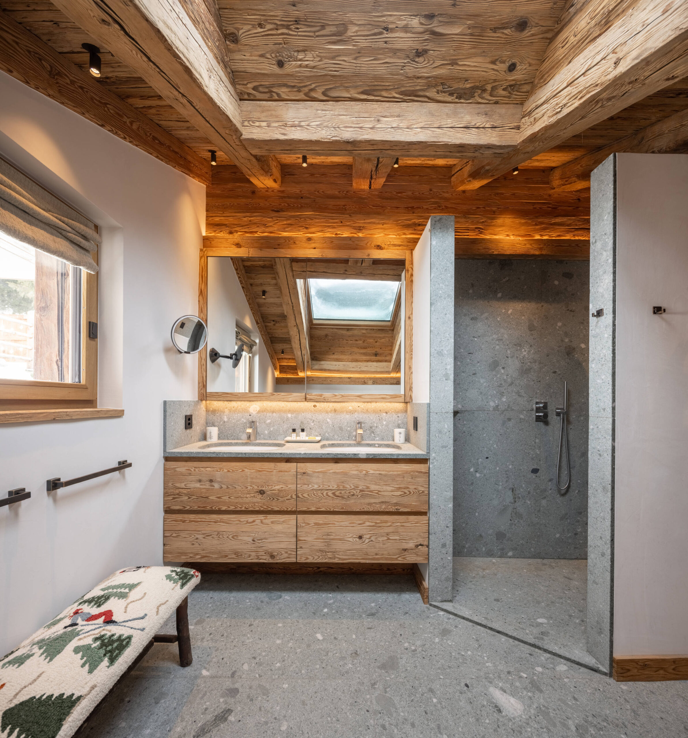Master bathroom with walk-in rain shower at Chalet Pierrier in Verbier