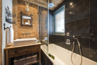 Master bedroom en suite bathroom at Apartment Silver in Verbier