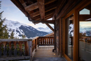 View from the balcony at dusk at Chalet Sirocco in Verbier