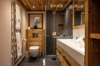 En suite shower room in bedroom two at Chalet Sirocco in Verbier
