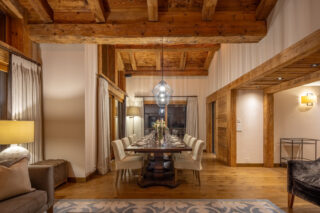 Dining area with table seating eight at Chalet Sirocco in Verbier