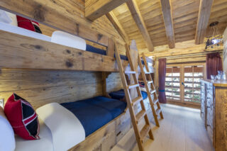 Quad bunk bedroom at Penthouse Treize Etoiles in Verbier