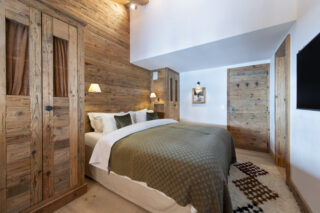 Double bedroom one at Penthouse Treize Etoiles in Verbier