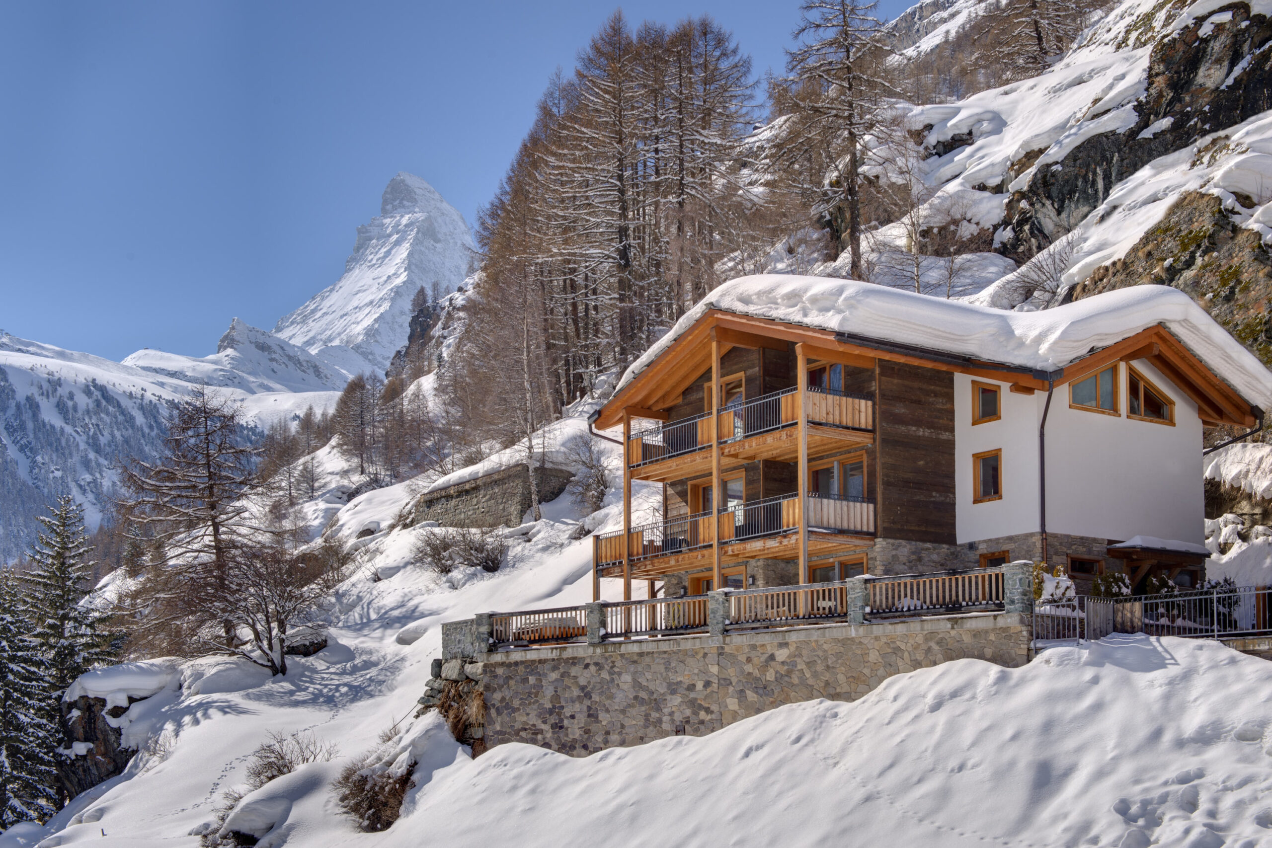 Exterior view of Chalet Gemini in Zermatt with the Matterhorn in the background