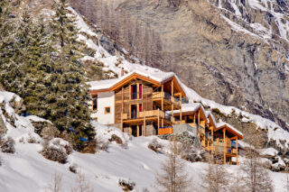 Les Perles chalets in Zermatt seen from lower down the mountainside