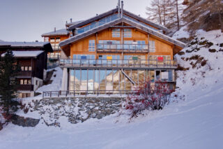 Front exterior view in winter of the Heinz Julen residence in Zermatt