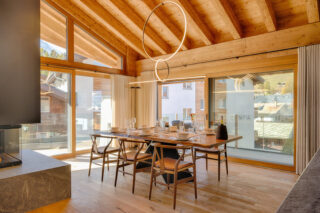 Dining table seating six at at Penthouse Weissmatten in Zermatt