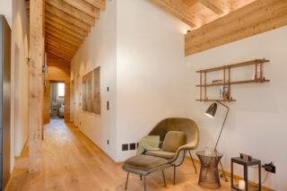 Hallway leading from living area to bedrooms at Penthouse Weissmatten in Zermatt
