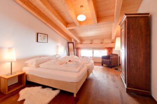 Bedroom one at Penthouse Zeus in Zermatt