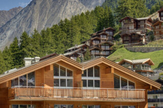 Exterior view of Penthouses Zeus and Zora in Zermatt in summer