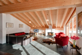Open plan living area at Penthouse Zeus in Zermatt