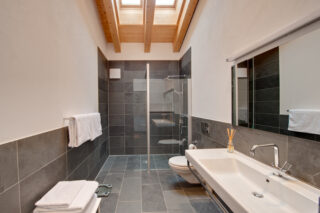 Bedroom one shower room at Penthouse Zora in Zermatt