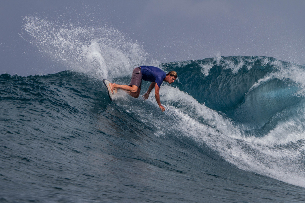 Surf Indonesian islands of Halmahera and Morotai catching a wave